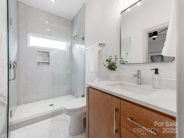 3501 Providence Rd, Charlotte, NC 28211 - bathroom with a shower stall, toilet, vanity, and marble finish floors