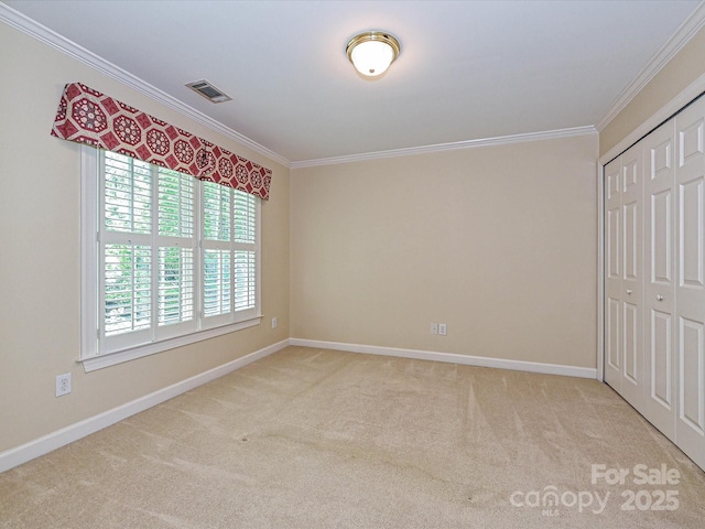 16511 Bridgehampton Club Dr, Charlotte, NC 28277 - unfurnished bedroom featuring ornamental molding, carpet, baseboards, and a closet