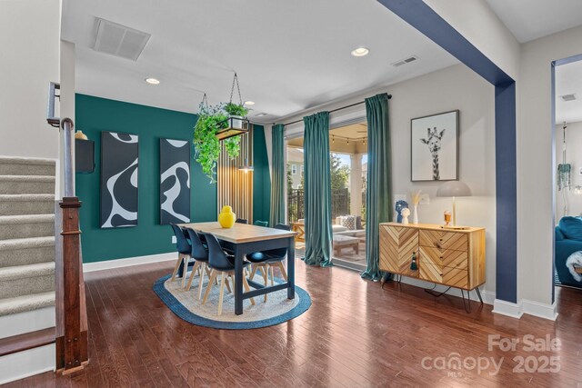 home office with baseboards, recessed lighting, wood finished floors, and visible vents