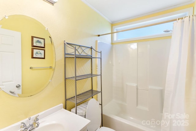 bathroom with crown molding, toilet, shower / bathtub combination with curtain, and vanity