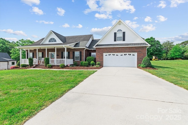 view of front facade featuring a front lawn, brick siding, a garage, concrete driveway, and covered porch