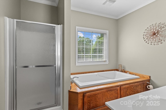 full bath with crown molding, a shower stall, a garden tub, and visible vents