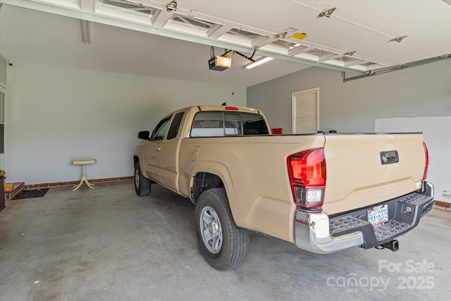 garage featuring a garage door opener