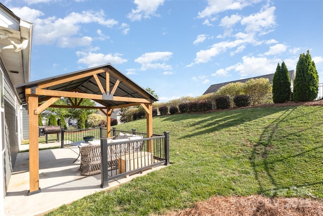 view of yard featuring a gazebo and a patio area