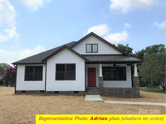 view of front of house with ceiling fan, crawl space, a standing seam roof, covered porch, and metal roof