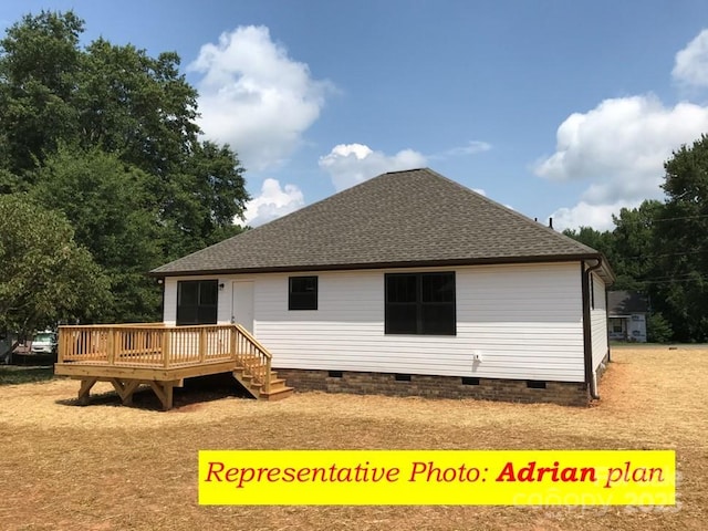 rear view of property featuring crawl space, a wooden deck, and a shingled roof