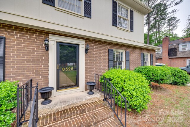 8525 Castlekeep Rd Unit 26, Charlotte, NC 28226 - property entrance featuring brick siding