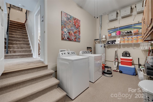 8525 Castlekeep Rd Unit 26, Charlotte, NC 28226 - laundry room with washing machine and dryer, gas water heater, and carpet floors