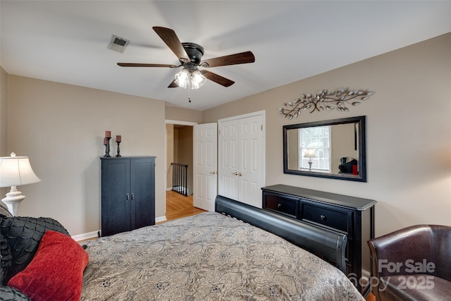 8525 Castlekeep Rd Unit 26, Charlotte, NC 28226 - bedroom featuring baseboards, a ceiling fan, and a closet