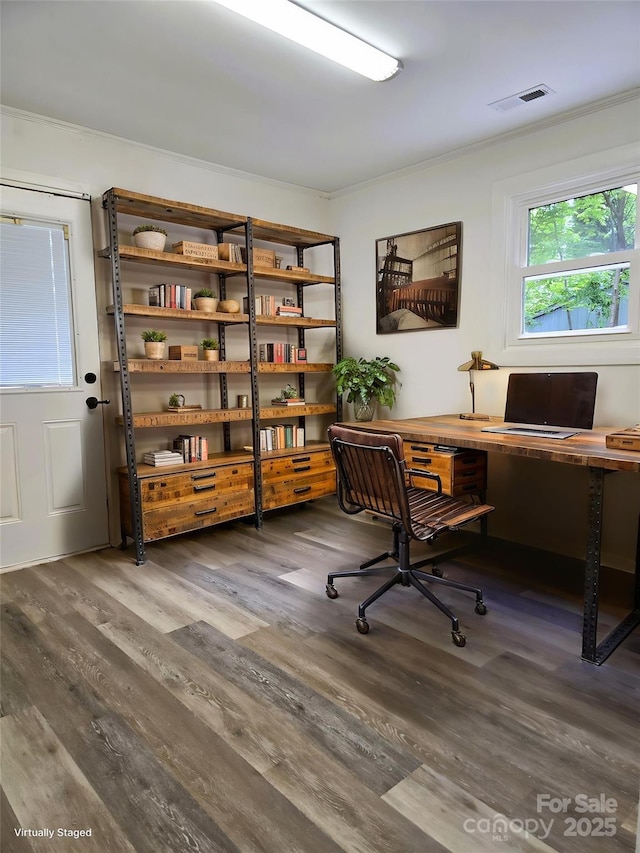 office area featuring crown molding, visible vents, and wood finished floors