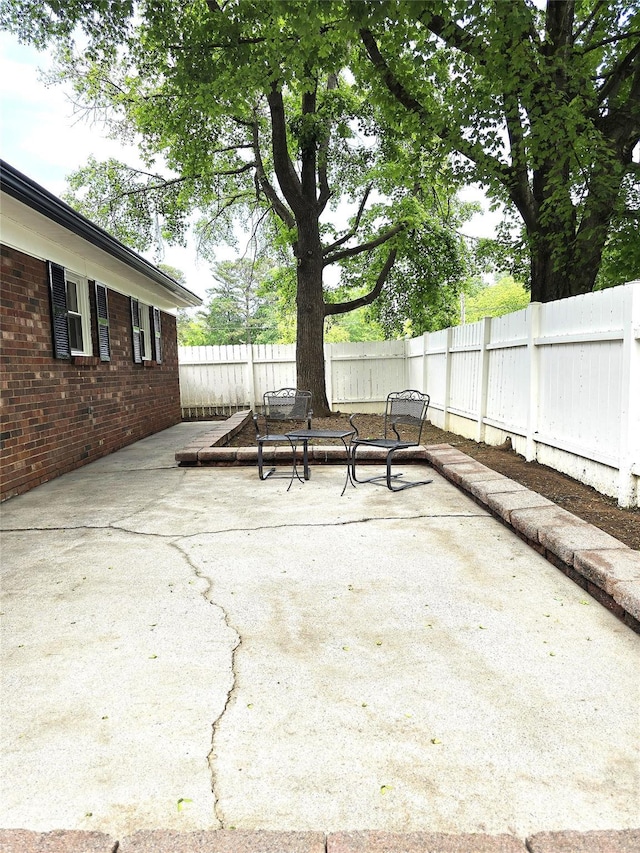 view of patio with a fenced backyard