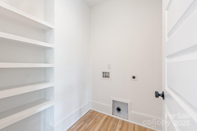 laundry room with washer hookup, laundry area, electric dryer hookup, light wood-type flooring, and baseboards
