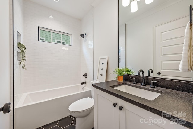 bathroom featuring toilet, tub / shower combination, tile patterned flooring, and vanity
