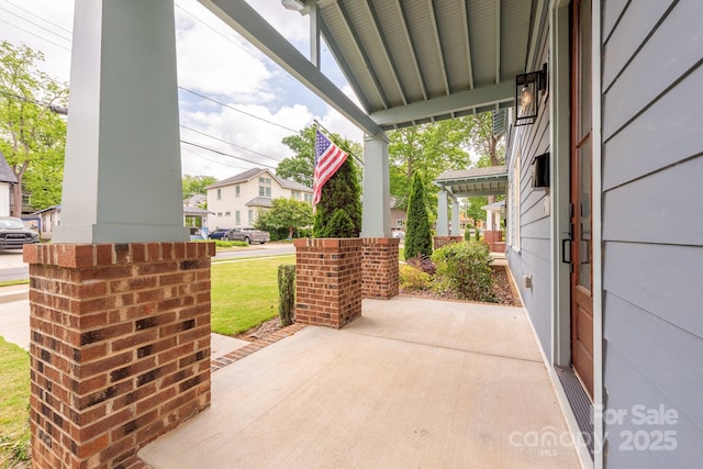 view of patio / terrace with a porch