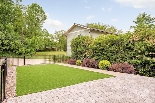 view of yard with a patio area and fence