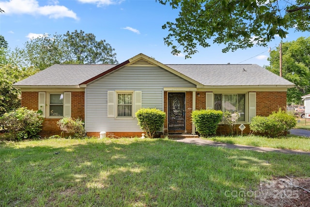 728 Dedmon Dr, Charlotte, NC 28216 - ranch-style home featuring a front lawn, brick siding, and roof with shingles