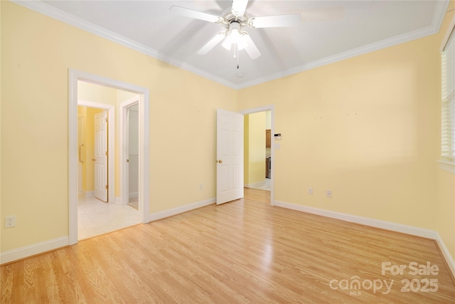 unfurnished room featuring baseboards, ornamental molding, light wood finished floors, and a ceiling fan