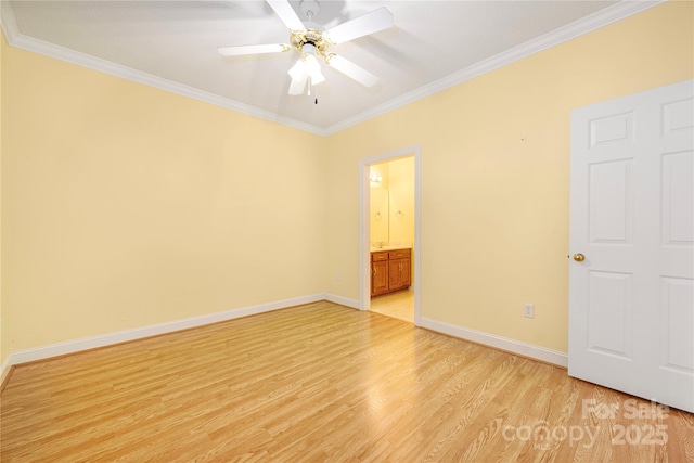empty room with crown molding, ceiling fan, baseboards, and light wood-style floors
