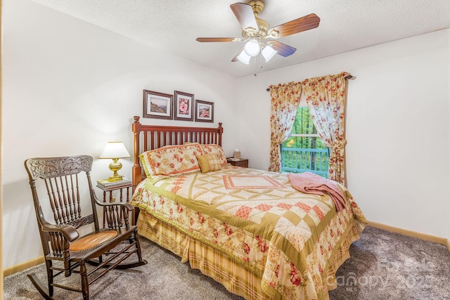 bedroom with carpet floors, baseboards, a ceiling fan, and a textured ceiling