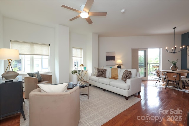721 Governor Morrison St Unit 520, Charlotte, NC 28211 - living area with a chandelier, wood finished floors, and a ceiling fan