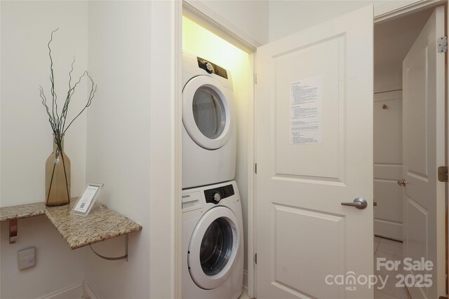 721 Governor Morrison St Unit 520, Charlotte, NC 28211 - clothes washing area featuring estacked washer and dryer
