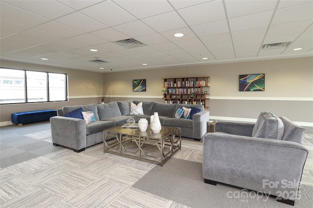 721 Governor Morrison St Unit 520, Charlotte, NC 28211 - carpeted living area featuring a paneled ceiling, recessed lighting, and baseboards