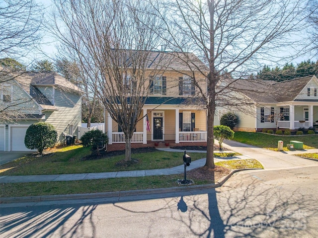 traditional home with a porch and a front yard