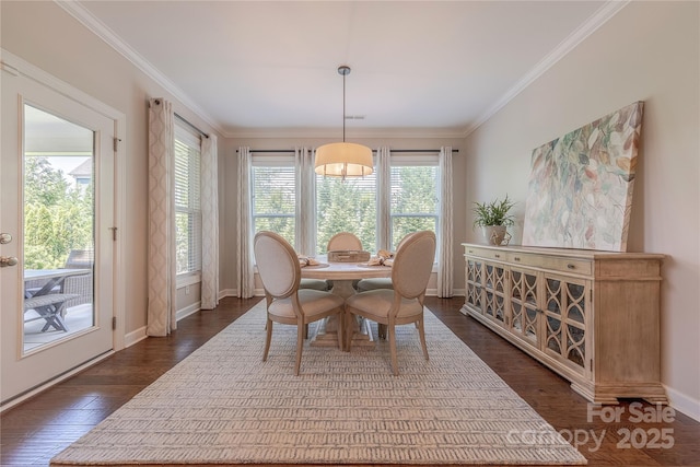 dining room with baseboards, ornamental molding, dark wood finished floors, and visible vents