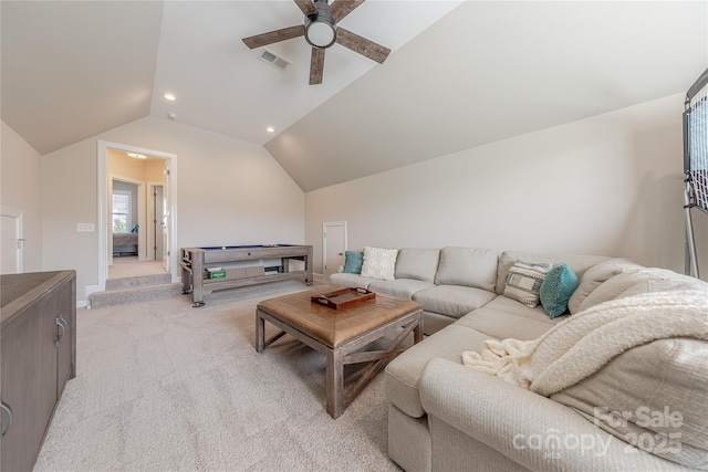 living area with light colored carpet, a ceiling fan, recessed lighting, vaulted ceiling, and visible vents