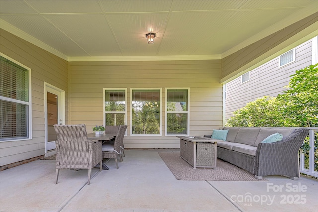 view of patio featuring an outdoor hangout area and outdoor dining space