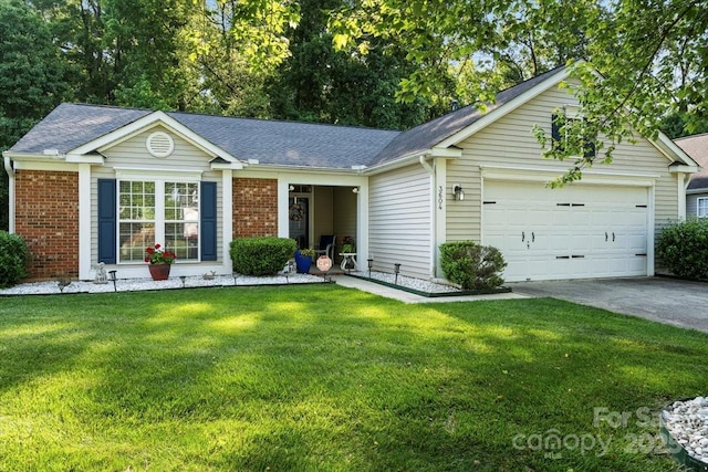 single story home with brick siding, driveway, a front lawn, and a garage