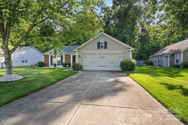 view of front of house with a garage, driveway, a front lawn, and brick siding