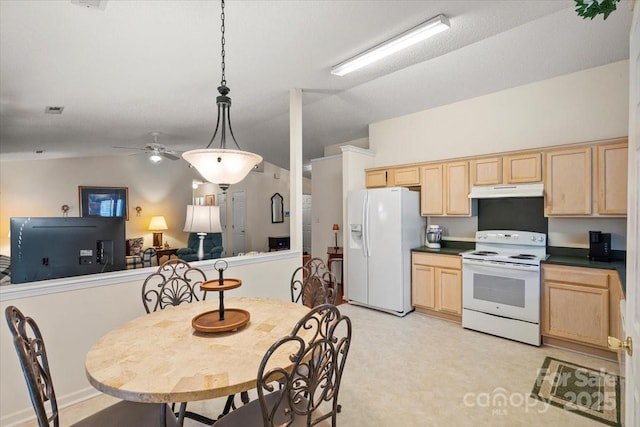 kitchen featuring dark countertops, light brown cabinets, white appliances, a ceiling fan, and under cabinet range hood