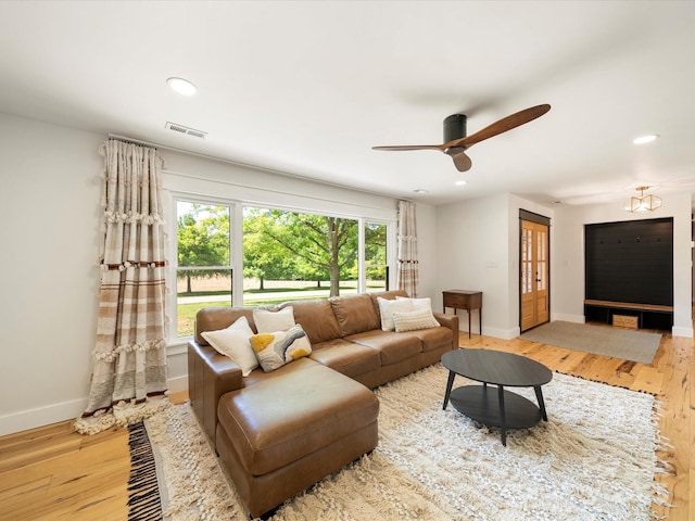 1207 Carlson Dr, Monroe, NC 28110 - living area with baseboards, wood finished floors, ceiling fan, and recessed lighting