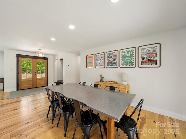 1207 Carlson Dr, Monroe, NC 28110 - dining area featuring recessed lighting, light wood-style flooring, and french doors
