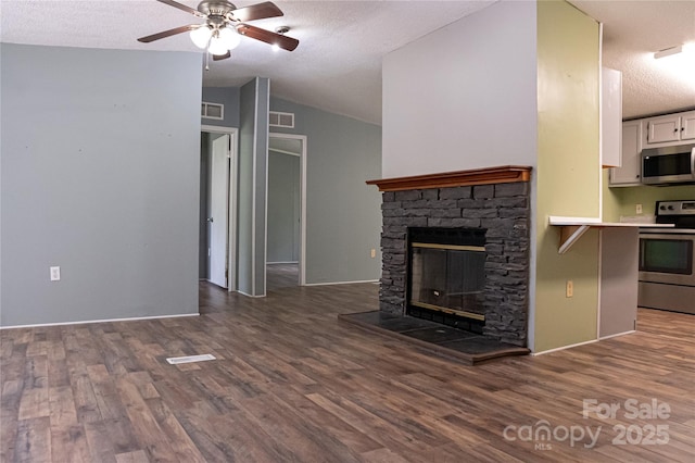 2844 Jamestown Rd Unit 2, Morganton, NC 28655 - unfurnished living room featuring ceiling fan, a textured ceiling, wood finished floors, lofted ceiling, and a fireplace
