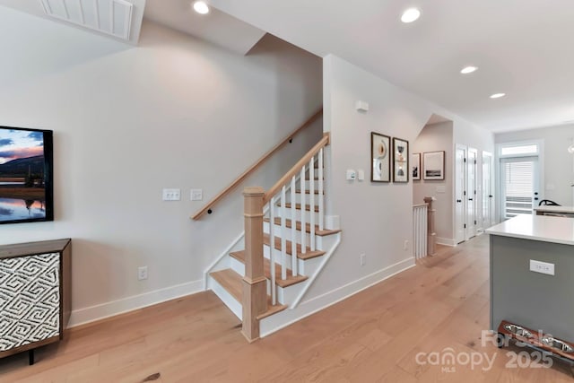 316 S Turner Ave Unit 11, Charlotte, NC 28208 - stairs with visible vents, recessed lighting, baseboards, and wood finished floors