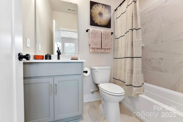 316 S Turner Ave Unit 11, Charlotte, NC 28208 - full bath with vanity, toilet, shower / bath combo with shower curtain, baseboards, and visible vents