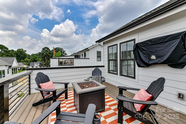 316 S Turner Ave Unit 11, Charlotte, NC 28208 - wooden deck with an outdoor fire pit