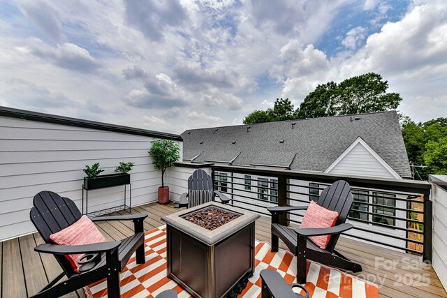 316 S Turner Ave Unit 11, Charlotte, NC 28208 - wooden deck featuring a fire pit