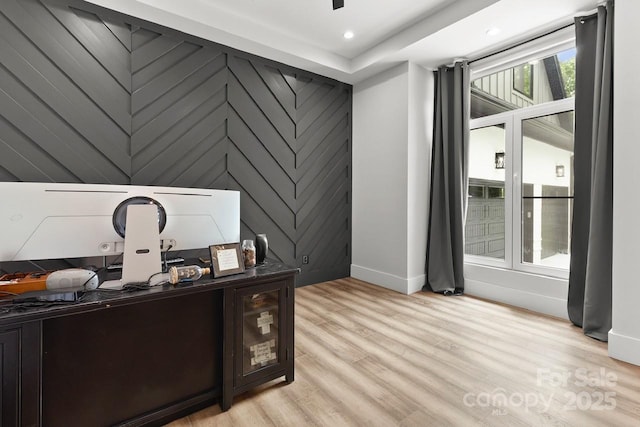 office featuring baseboards, recessed lighting, and light wood finished floors