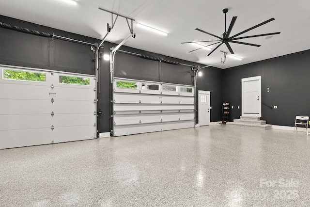 garage featuring baseboards