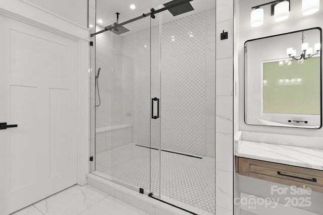 full bath with recessed lighting, marble finish floor, a stall shower, and vanity