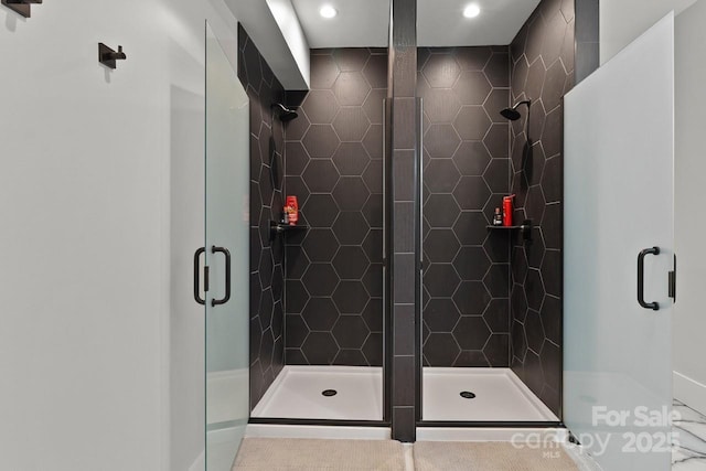 full bath with recessed lighting and a stall shower