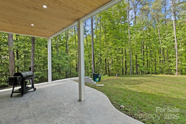view of patio with a grill