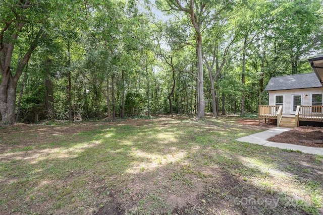 view of yard featuring a deck