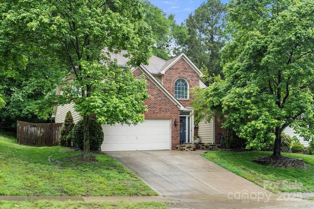 traditional-style house with concrete driveway, brick siding, and an attached garage