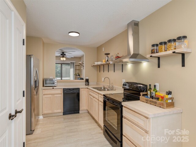 23 Hollybrook Dr, Asheville, NC 28803 - kitchen featuring light brown cabinetry, open shelves, a sink, wall chimney exhaust hood, and black appliances