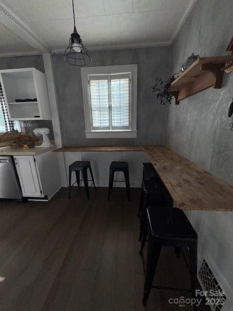dining room featuring dark wood finished floors