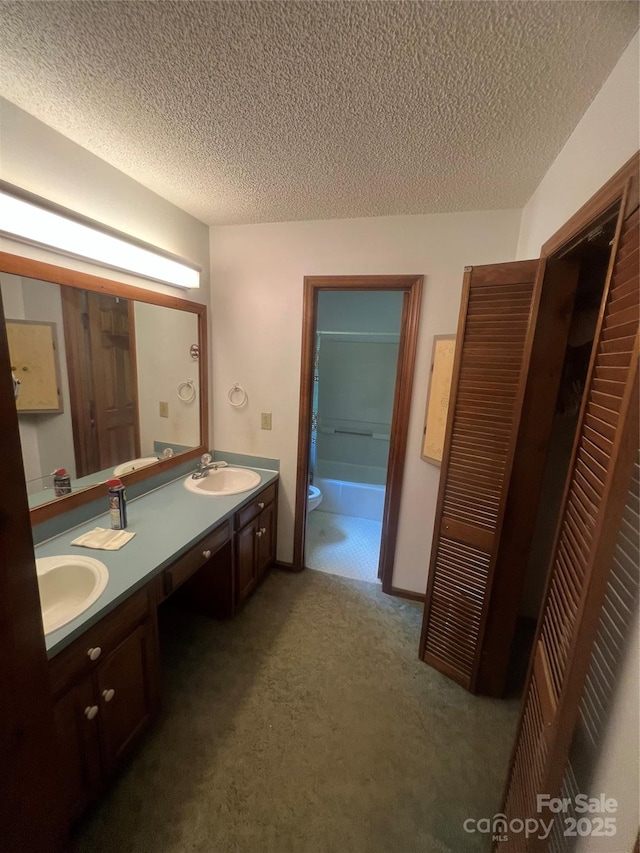 1502 Shelby Hwy, Cherryville, NC 28021 - full bathroom with toilet, a textured ceiling, and double vanity